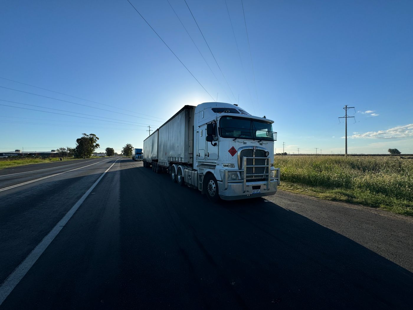 A tractor-trailer on the highway